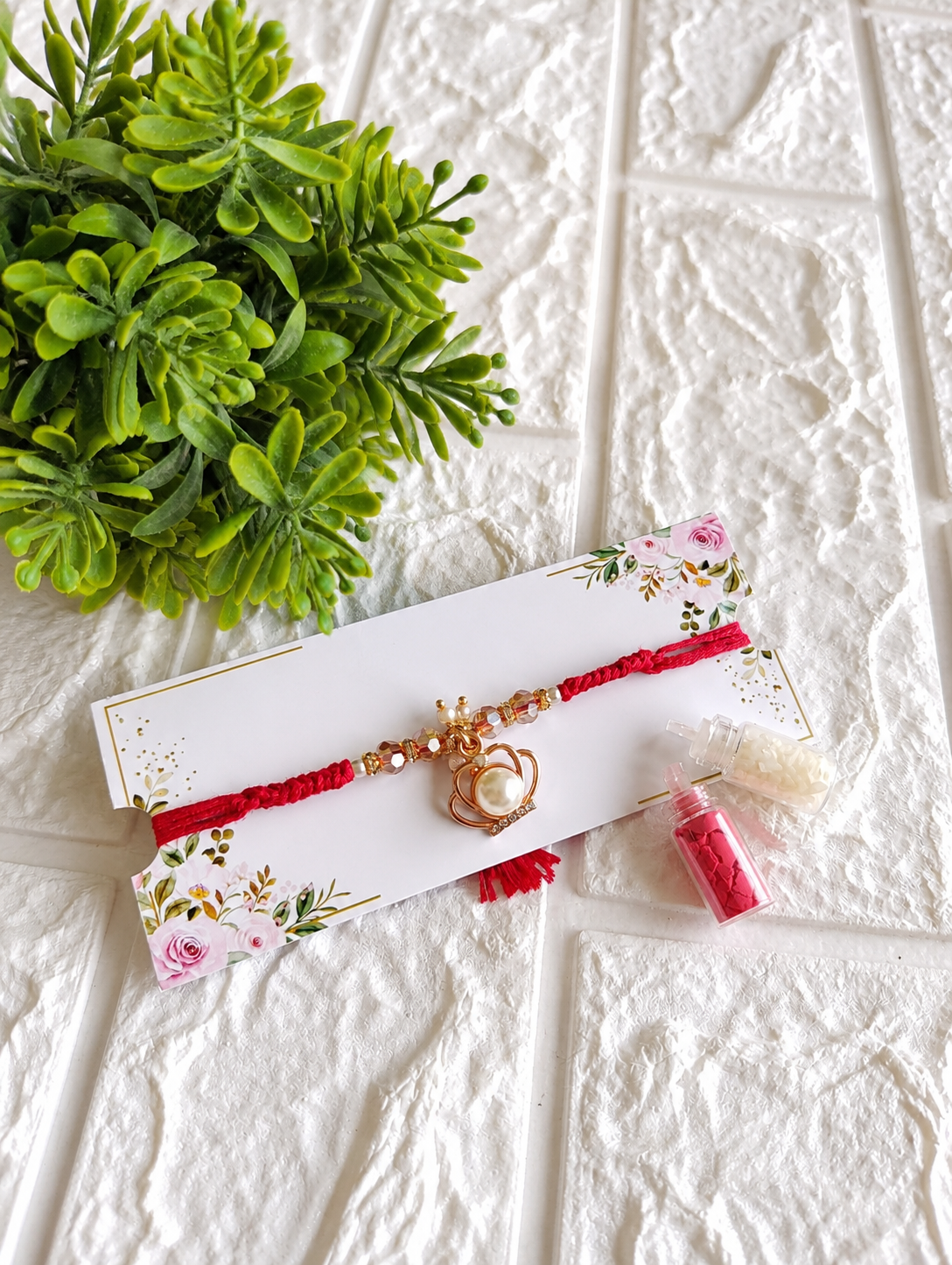 Royal Pearl Crown Designer Rakhi with Roli Chawal Vials
