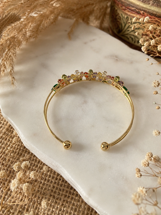 Multicolored floral bracelet on a white marble