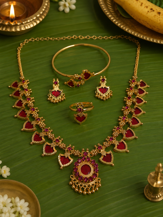Celebrate the timeless beauty of Kerala tradition with this elegant Palakka Combo Jewelry Set, featuring a matching necklace, earrings, adjustable ring, and kada. Crafted with a premium gold finish and intricate detailing, this lightweight set is perfect for weddings, festivals, temple visits, and ethnic occasions. A graceful addition to every traditional jewelry collection.