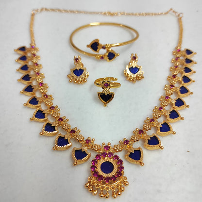 Jewelry set with necklace, earrings, ring, and bracelet on a white background